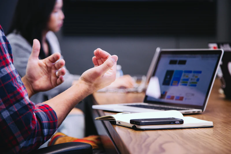 A mentor explaining a point during a session